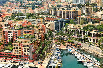 Yachts and modern buildings in Monte Carlo, Monaco.