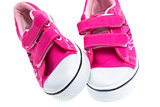 Pink sneakers isolated on white background