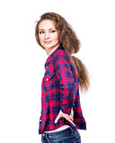 Attractive young woman in a checkered shirt