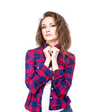 Attractive young woman in a checkered shirt