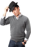 Young handsome man wearing black hat