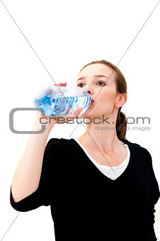 woman drinking water against white background