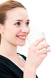 woman drinking water against white background