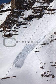 Snow slope with trace of avalanche