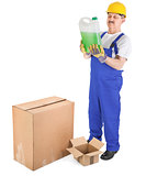 worker recives delivery with green liquid 