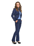 Full length portrait of smiling business woman