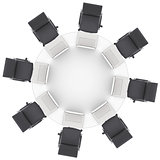 Laptops on the office round table and chairs