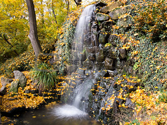 waterfall in the autumn park