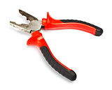 opened pliers with red handle