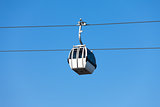 Cable car on blue sky background