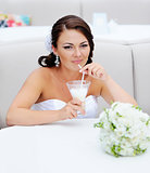 young bride drinking cappuccino