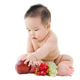 Baby boy with fruits