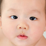 Asian baby boy close up face