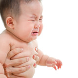 Sad Asian baby boy crying