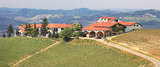 Panoramic view on farmhouse on the hill in Italy.