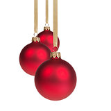 three red christmas balls hanging on ribbon