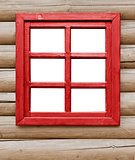 Red wooden window on the farmhouse