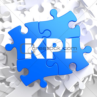 KPI on Blue Puzzle Pieces. Business Concept.
