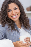 Beautiful Woman Smiling Drinking Tea or Coffee 