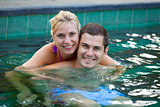 Happy honeymoon in a swimming pool