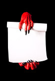 Red devil hands holding paper scroll 