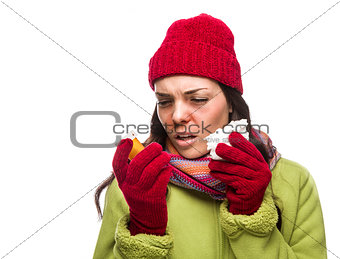 Sick Mixed Race Woman with Empty Medicine Bottles Blowing Nose  