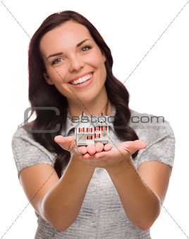 Pretty Mixed Race Woman Holding Small House Isolated on White