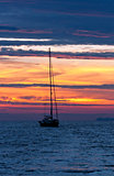 Sailing boat and sunset