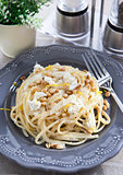Linguine with cheese, pine nuts and citrus zest 