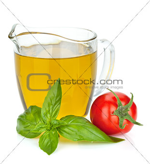 Olive oil, tomato and basil leaves