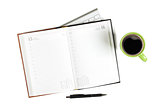 Blank notepad and coffee cup