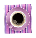 Purple coffee cup over kitchen towel