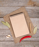 Blank notepad on wooden table