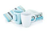 Kitchen towels and tea cups
