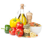 Fresh ripe vegetables, pasta and condiments 