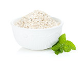 Oat flakes in bowl and mint