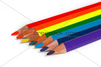 Many colored pencils as rainbow