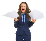 Frustrated business woman with documents