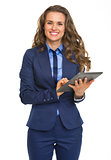 Happy business woman using tablet pc