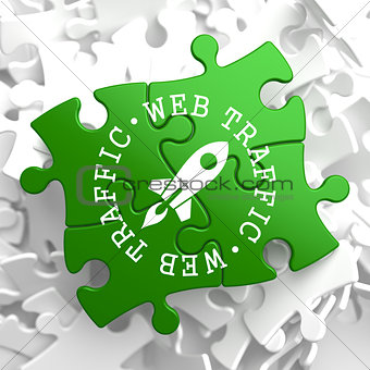 Web Traffic Concept on Green Puzzle Pieces.