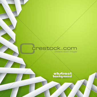 Abstract paper ribbons on green background