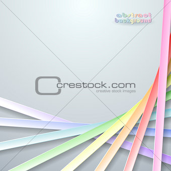 Abstract paper rainbow ribbons on gray background