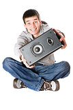 Smiling young man with a speaker