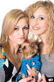 two smiling young women with dog