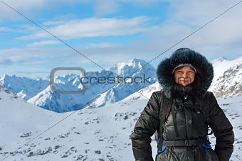 Woman on winter mountain background (Austria).