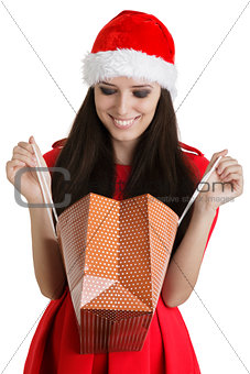 Christmas Girl Looking in Shopping Bag