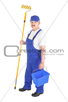 House painter in blue dungarees over white