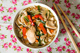 Bowls of Asian soup noodles and vegetables 