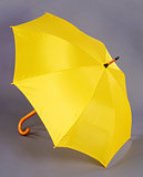 yellow umbrella on a gray background