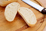 Closeup of a freshly cut bread roll